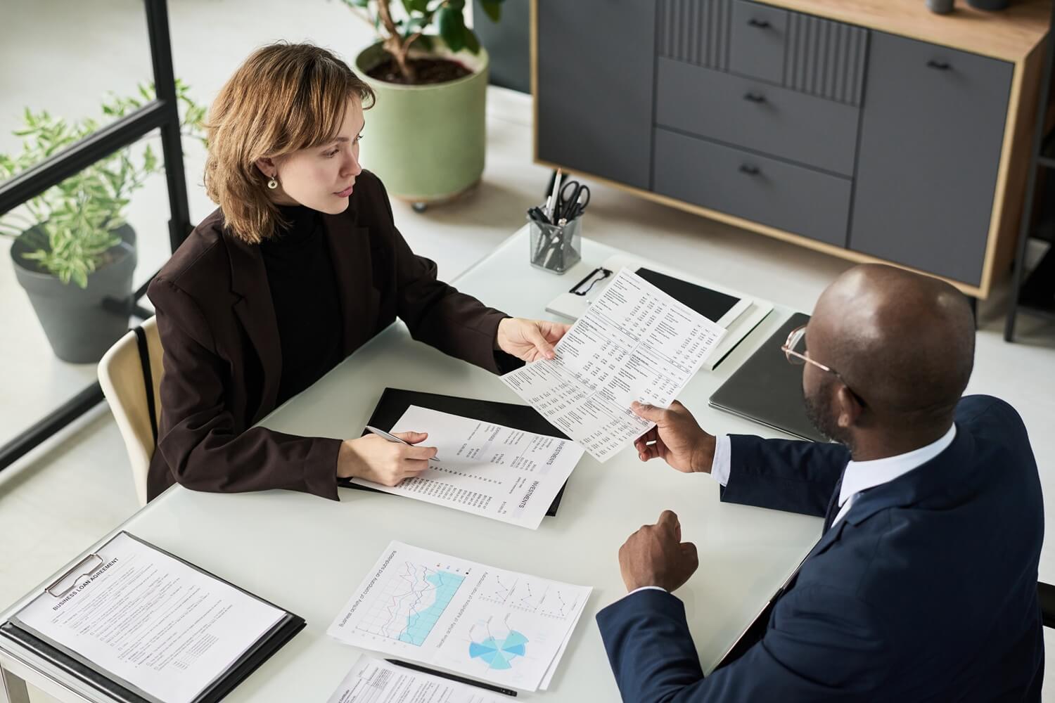 Office environment showing paperwork in active use.