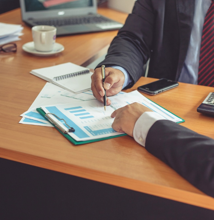 Office task involving review and organization of files.