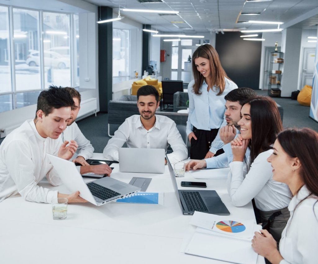 Audit and finance professionals collaborating in a modern office.