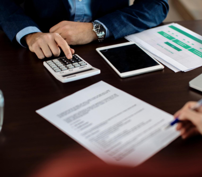 Corporate executive presenting taxation and financial growth concepts